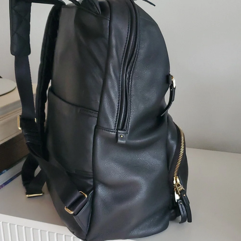 Tumi Voyageur Halle Black Leather Backpack with Gold Hardware
